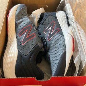 Brand new in box. Men’s size 14 New Balance